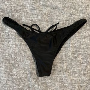 Cheeky black bikini bottom